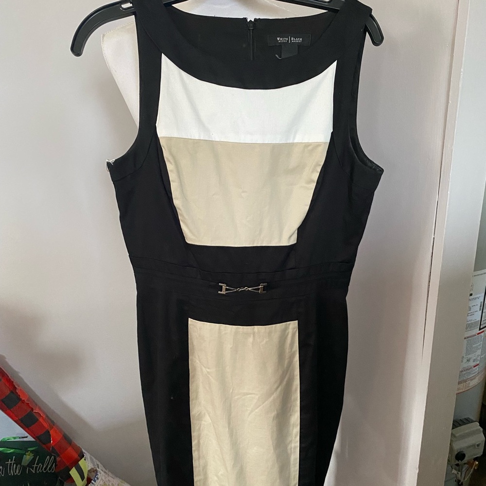 White House black market barely worn no flaws hits mid shin perfect for events.